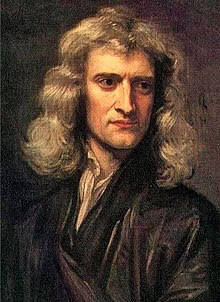 Head and shoulders portrait of man in black with shoulder-length grey hair, a large sharp nose, and an abstracted gaze